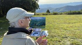 David Dorrell of New Jersey paints a landscape from Rocky Knob during the 2026 Floyd Plein Air Biennial.