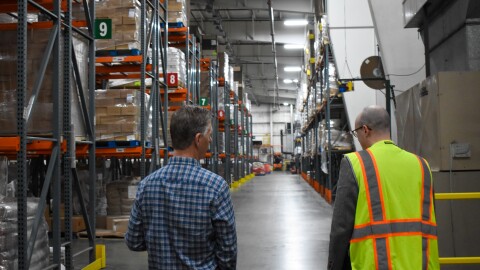 Up To Date host, Steve Kraske, takes a tour of the Harvesters warehouse with the organization's communications manager, Matt Hamer. Hamer remarked that the warehouse is more empty than usual due to a higher demand for food.