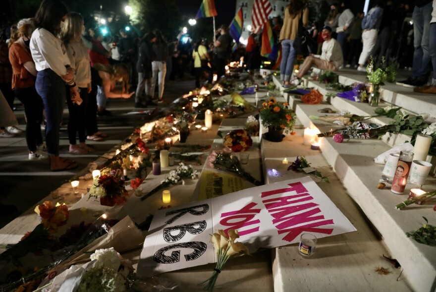 A crowd gathers at the U.S. Supreme Court to mourn the death of Supreme Court Justice Ruth Bader Ginsburg on Friday.