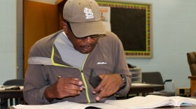 David Wea, 62, works on a geometry problem in an adult education class. August 25, 2017.