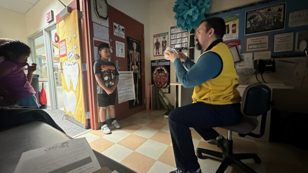 Optometrist Patrick Campaign screens a student's vision in Unalaska in August 2026.