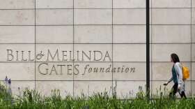 A person walks by the headquarters of the Bill and Melinda Gates Foundation on April 27, 2018, in Seattle. The Bill and Melinda Gates Foundation announced Sunday, Oct. 16, 2022, that it will commit $1.2 billion to the effort to end polio worldwide.