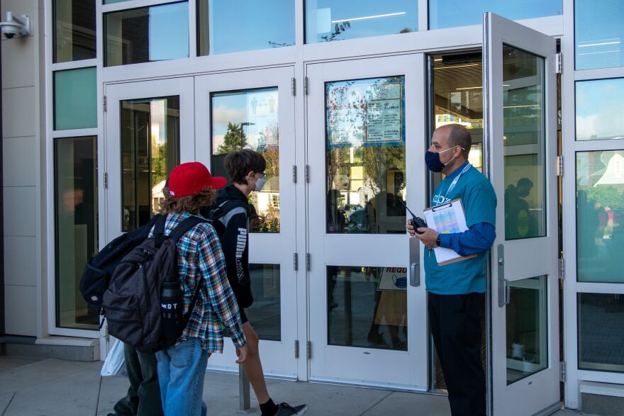 Kellogg Middle School principal Richard Smith greets students on the first day of school September 1, 2021. Kellogg was one of a few Portland Public Schools to report "on-site" transmission of COVID-19 toward the beginning of the school year.