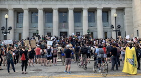 Protesters gathered in front of Central Library Wednesday, June 3 before marching through Indianapolis to Monument Circle.
