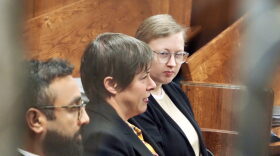 Former Norman High School teacher Summer Boismier, far right, sits next to her attorneys, Iris Halpern, center, and Neil Sandhu, left, before a hearing in Oklahoma County District Court on Wednesday in Oklahoma City.