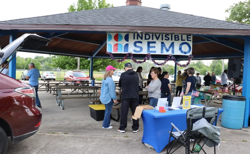 Community members gather for a meet-and-greet hosted by Indivisible SEMO.