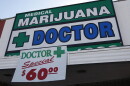 A sign outside a medical marijuana evaluation clinic in Los Angeles.