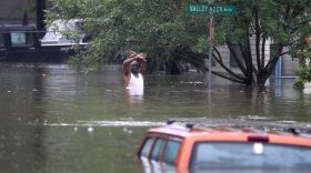 Jennifer and Randy Claridge's home has already been flooded twice before Harvey. Pictured: A man waves down a rescue crew as he tries to leave the area after it was inundated with flooding from Hurricane Harvey on Aug. 28, 2017 in Houston, Texas. (Joe Raedle/Getty Images)