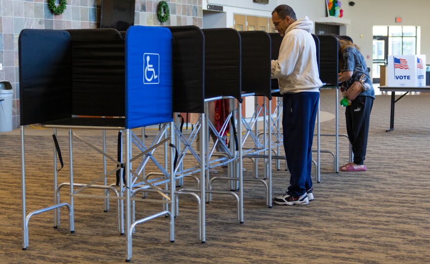 In the lobby of Hopevale Church, Saginaw Township voters cast their vote in the August 4 primary election.
