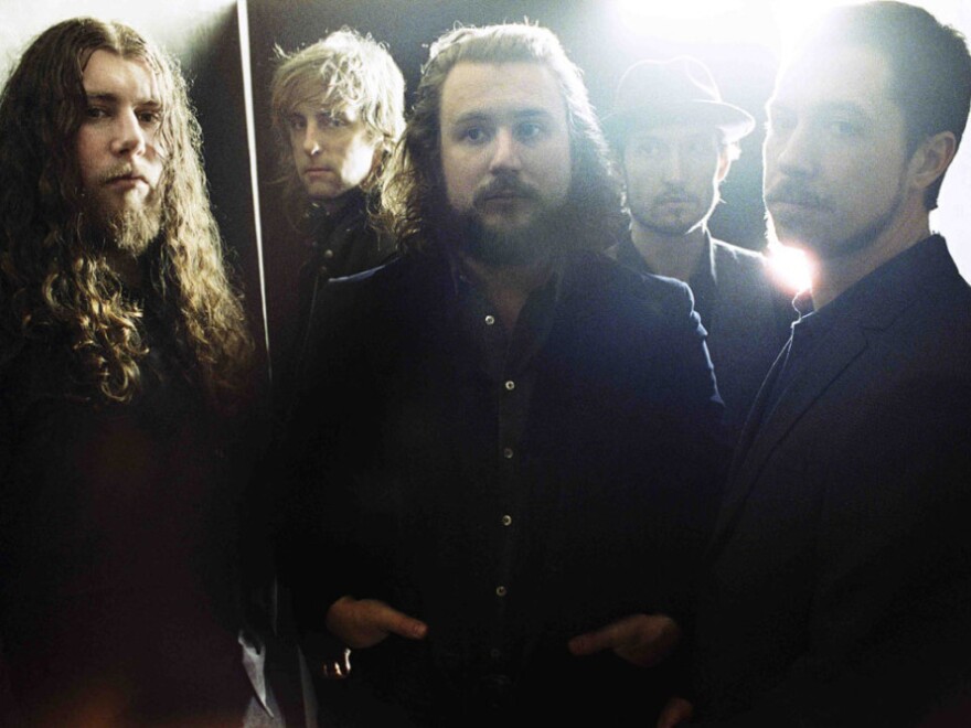 My Morning Jacket frontman Jim James (center) says the band's new album, <em>Circuital</em>, presented a special challenge: recording in his hometown of Louisville for the first time.