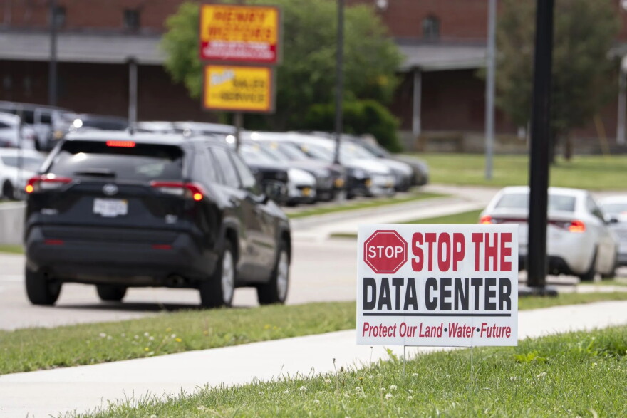 A “Stop the Data Center” sign sits along South 11th Street in Nebraska City, Nebraska, in May 2026.