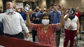 Supporters of President Donald Trump cheer as he arrives to speak during an event on "Protecting America's Seniors," Friday, Oct. 16, 2020, in Fort Myers, Fla. (AP Photo/Evan Vucci)