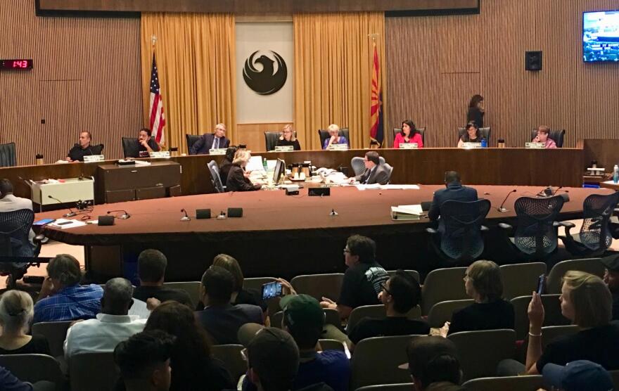 council sitting on dais