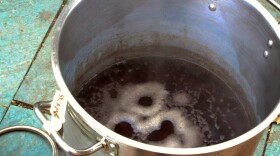 New Hampshire sycamore sap boils down into syrup at researcher David Moore's house in Lee.