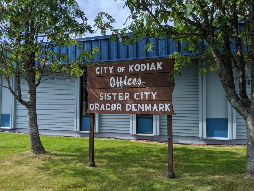 The City of Kodiak sign at the Kodiak Island Borough Building. (Photo by Kavitha George/KMXT)