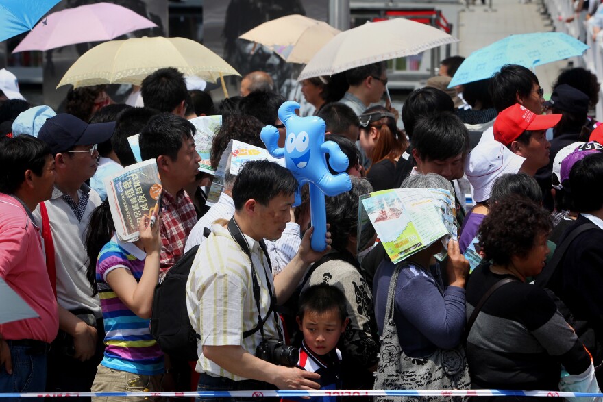 Visitors queue up to enter the France Pavilion on the second day of the Shanghai World Expo on May 2, 2010 in Shanghai, China.
