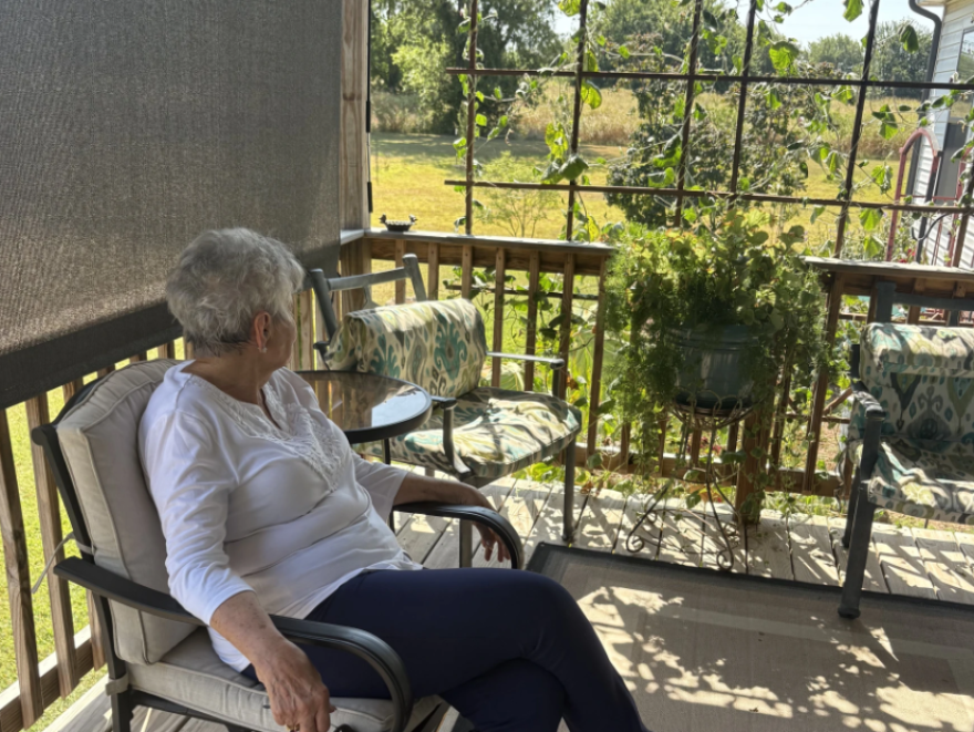 JaNelle Rutledge looks out over her home near Slaughterville.