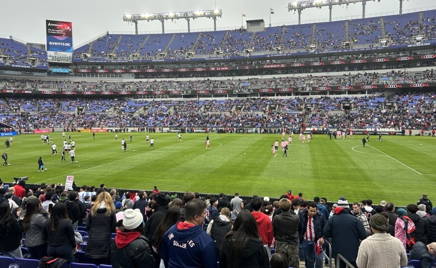The crowd was largely quiet and focused on the field, with few cheers for the home team.