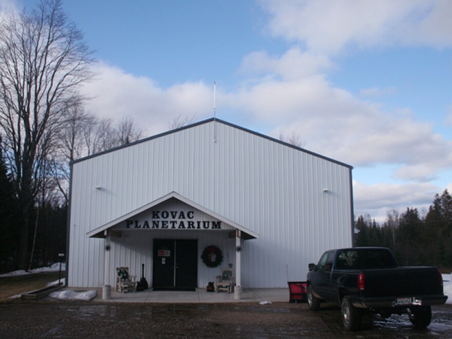 The planetarium is housed in a warehouse structure in Frank Kovac's backyard. This building is one of the few things here that Frank didn't build alone.