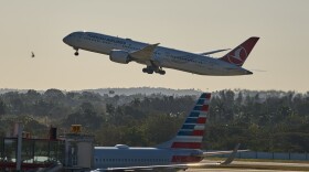 A Turkish Airlines plane takes off alongside an American Airlines plane at Jose Marti International Airport in Havana, Cuba, Monday, Feb. 9, 2026.