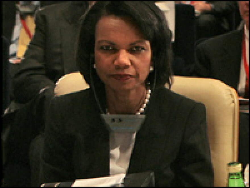 Secretary of State Condoleezza Rice listens to a presentation at an international conference on Iraq.
