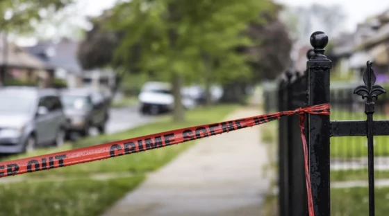 Police tape remains Monday on a gate in the 7600 block of South Bishop Street, where an armed standoff Sunday led to the arrest of five suspects in Saturday’s fatal shooting of Chicago Police Officer Areanah Preston.