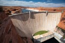 As water levels in Lake Powell keep dropping, some say they could fall too low to pass through Glen Canyon Dam at sufficient levels. Activists are calling for changes to the dam's plumbing to keep enough water flowing to the states that depend on it downstream.