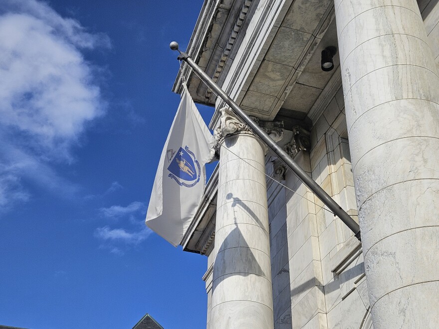 The Massachusetts flag flying over city hall in Pittsfield, Massachusetts.