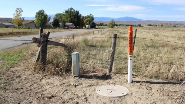 White poles with orange caps mark places Nemont Communications recently installed fiber optic to bring better internet speeds to Belfry, MT. The work was funded in part by the USDA’s ReConnect program, which funds broadband buildout in rural areas.