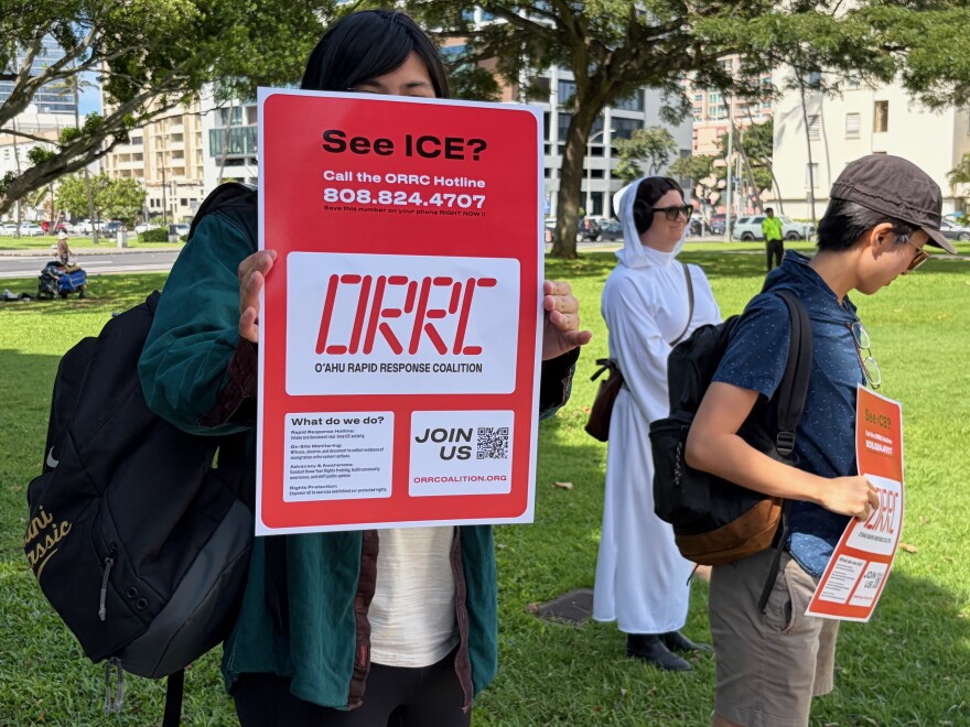 Various participants seen at the "No Dictators" rally on March 28, 2026.