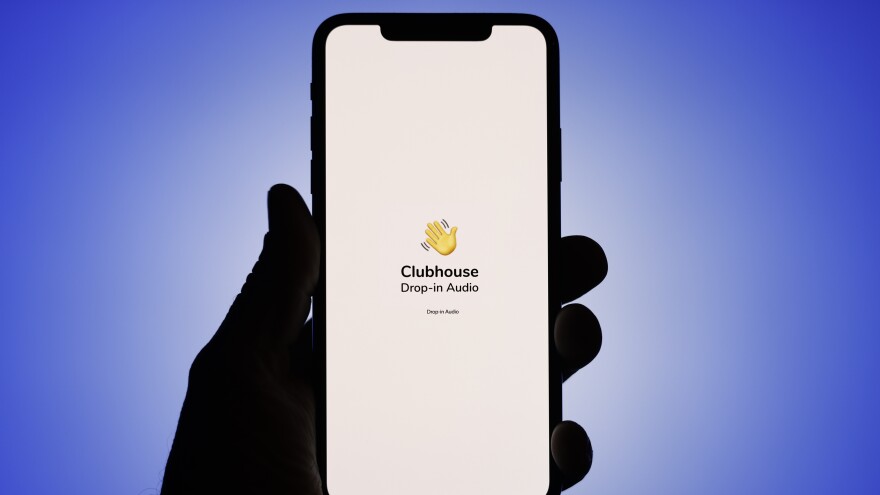 The Clubhouse logo is seen on an iPhone screen in this photo illustration. A Clubhouse room has become a place where Palestinians and Israelis speak openly about the conflict in Gaza.
