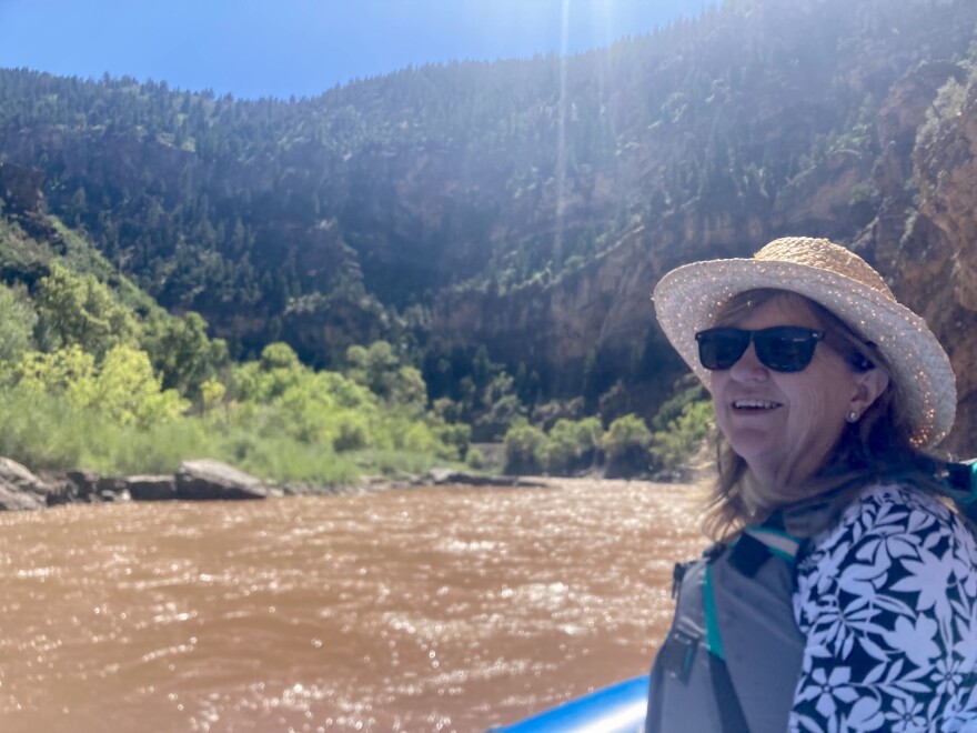 Colorado Democratic State Sen. Lisa Cutter looks downstream while rafting on the Colorado River. She traveled to Glenwood Springs to participate in a demonstration aimed at raising awareness about the fight against the Uinta Basin Railway.