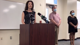 Union County School Board chair Melissa Merrell speaks Monday at a press conference announcing the resignation of Travis Kiker from the board.