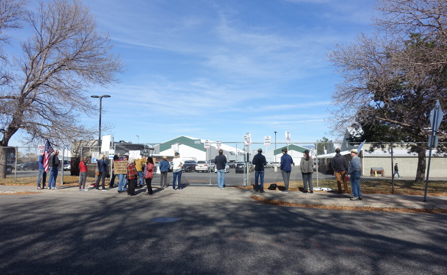 Protesters outside of Speak of the U.S. House Mike Johnson's campaign stop in Bozeman