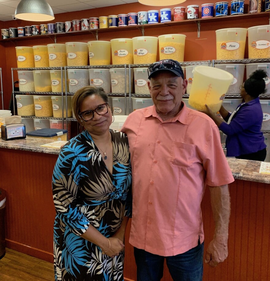 Magda Walker (left) owner of Chicagoland Popcorn in Merrillville, Indiana visits with correspondent Tom Wilmer