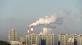 Smokestacks belch in Weihai, in China's Shandong province, in 2019. China is set to surpass pre-pandemic levels of carbon dioxide emissions this year.