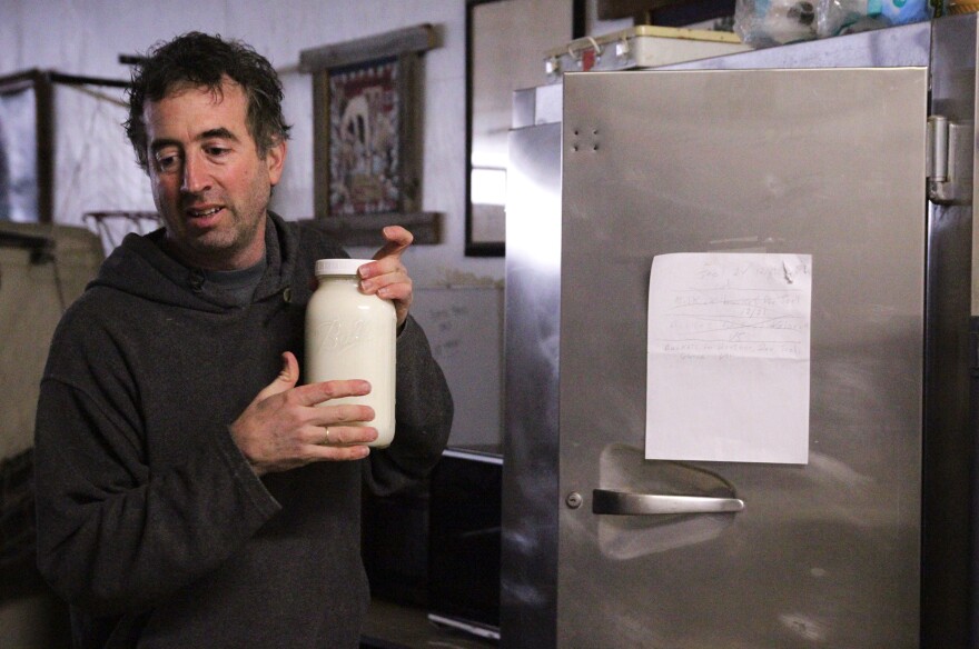 Joel Gruver is the milkman for a group of raw milk drinkers in Macomb, Ill.