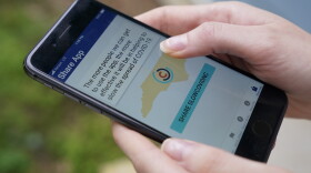 North Carolina's cell phone app contact tracing SlowCOVIDNC is shown on Friday, Dec. 4, 2020, in Charlotte, N.C. An analysis shows that few Americans are utilizing contact tracing technology launched in a host of U.S. states and territories.