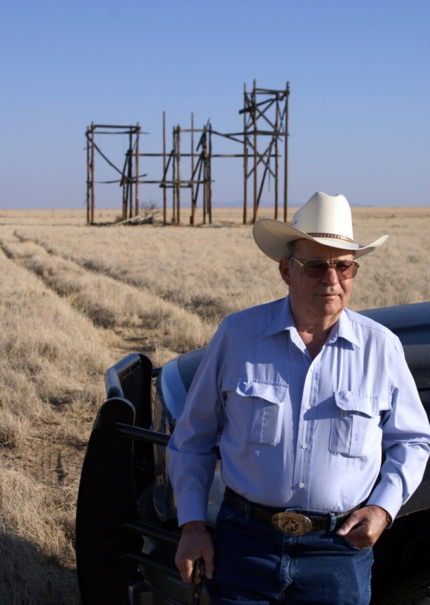 Clay Evans stands before the ruins of the mansion built for the 1956 film <em>Giant</em>. Evans, whose family has owned the ranch since back before the movie was filmed, recently put it up for sale.