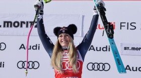 United States' Lindsey Vonn celebrates winning an alpine ski, women's World Cup downhill, in St. Moritz, Switzerland, Friday Dec. 12, 2025.