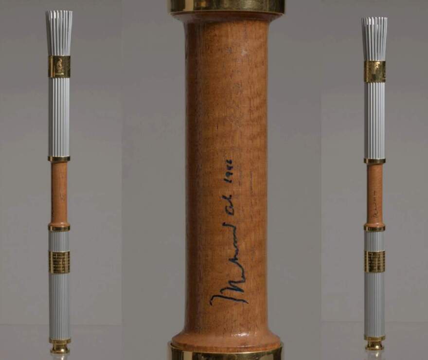 Olympic Torch from the
1996 Atlanta games signed by Muhammad
Ali. (Courtesy of the Collection of the Smithsonian National Museum of African American History and Culture)