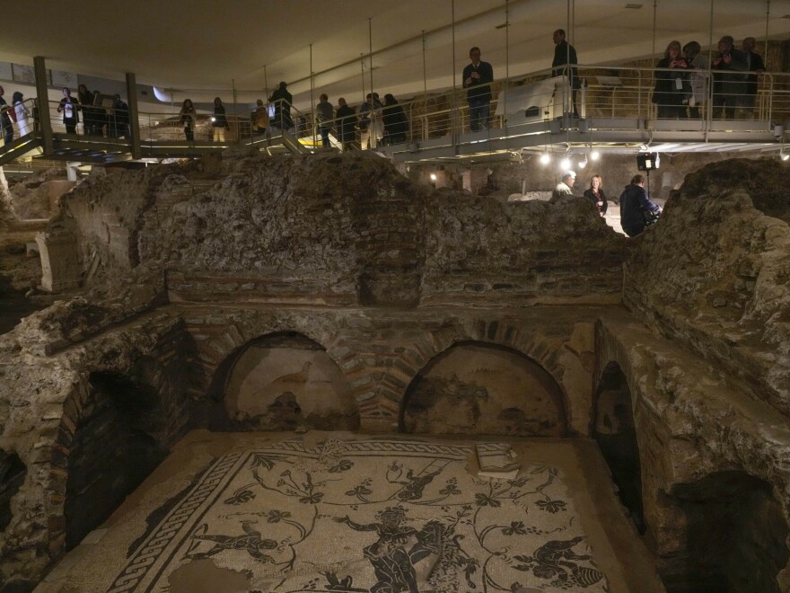 Visitors explore the Roman Necropolis at The Vatican.