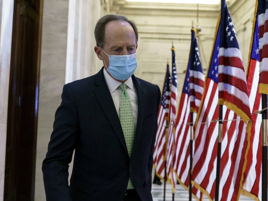 Sen. Pat Toomey, R-Pa., departs after the Republican Conference held leadership elections, on Capitol Hill in Washington, Tuesday, Nov. 10, 2020. (AP Photo/J. Scott Applewhite)