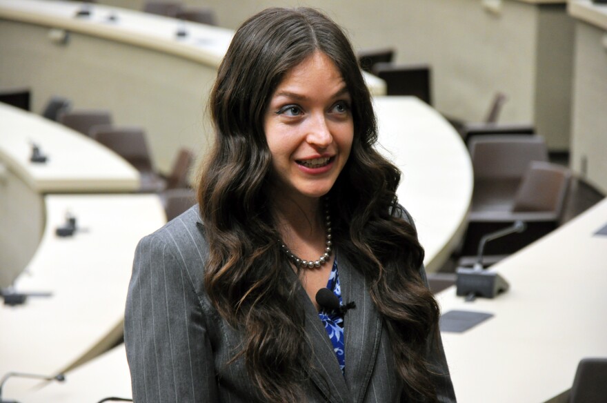 University of Alabama Law School student Sav Miles answers questions from the media.