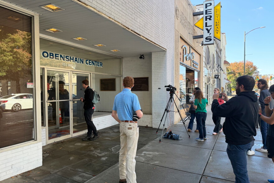 Reporters gather outside the Obenshain Center on Thursday, Oct. 29, 2026, in Richmond, Va.