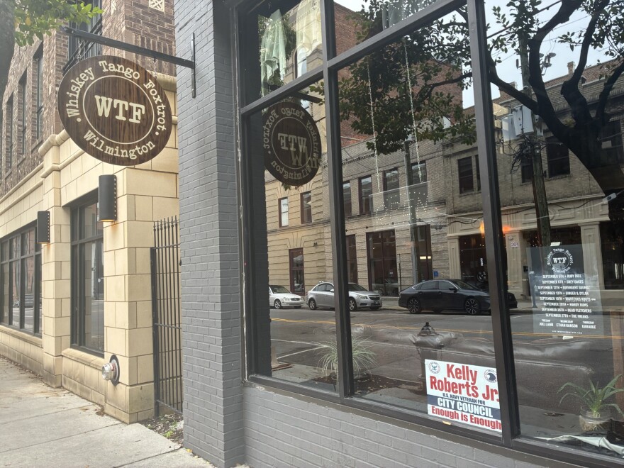 Whiskey Tango Foxtrot is one of a dozen downtown businesses showing visible support for Candidate Kelly Roberts Jr.