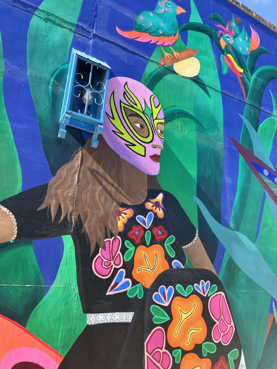 Some of the figures, including The Chili Queens, depicted as birds in "The Spirit Within" mural.