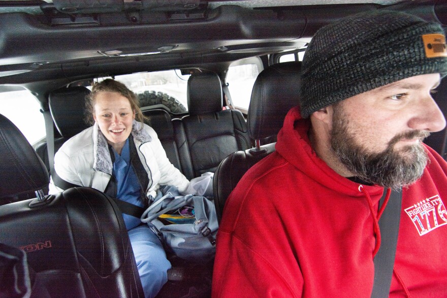 Kate Riordan, x-ray technologist, is given a lift home from Ryan Sermersheim Monday afternoon. While roads to her Evansville west side home weren't perfect that afternoon, they weren't drivable that morning — except by a lifted four-wheel drive. Sermersheim is president of Evansville Area Jeepers, which activates Operation Snowflake to drive essential workers to their places of employment — like hospitals.