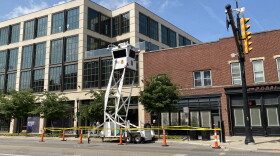 A police watch tower sits on North High Street in Columbus, fenced off with police tape.