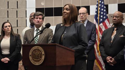 New York State Attorney General Letitia James speaks inside the Frank L. Merriweather Library Wednesday, Feb. 11, 2026, to announce a settlement in connection with the mass shooting which happened just two blocks away on May 14, 2022.